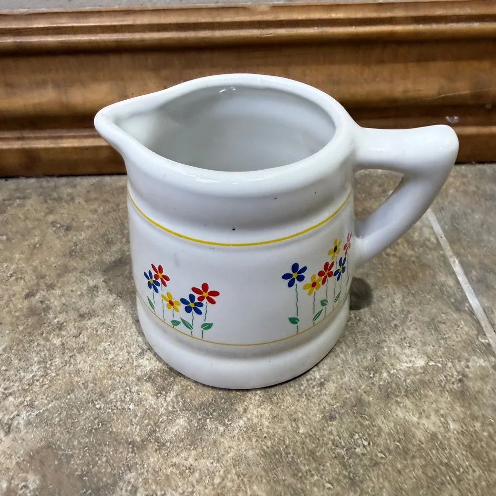Vintage ceramic‎ 3/4 cup measuring pitcher with charming floral design.